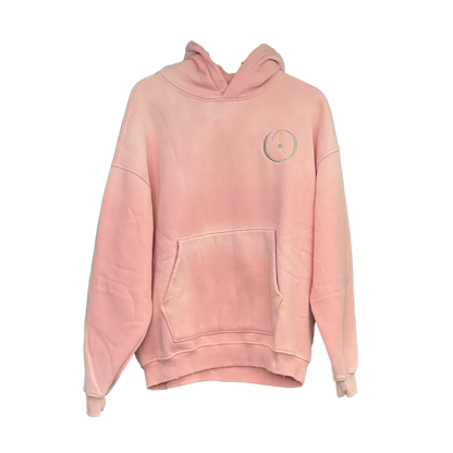 a pink sweatshirt with a black background