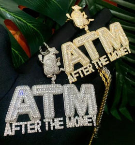 a gold and silver jewelry on a black cloth