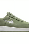 a green and white sneaker