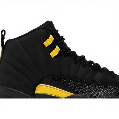 a close up of a black and yellow shoe