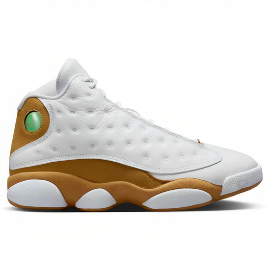 a white and gold basketball shoe