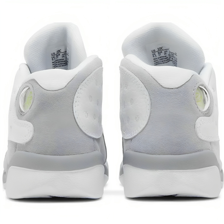 a pair of white and grey sneakers