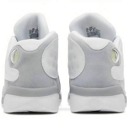 a pair of white and grey sneakers