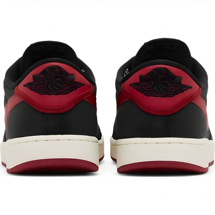 a pair of black and red shoes