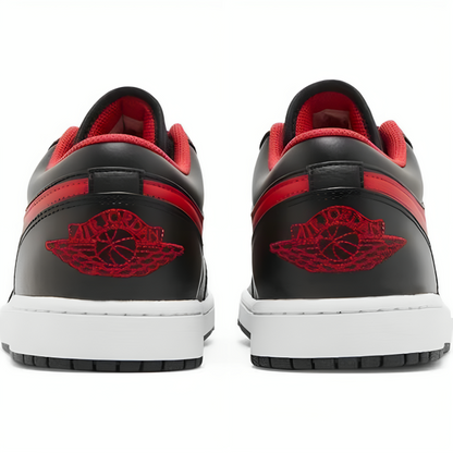 a pair of black and red sneakers