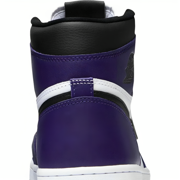 a close up of a purple and white boot