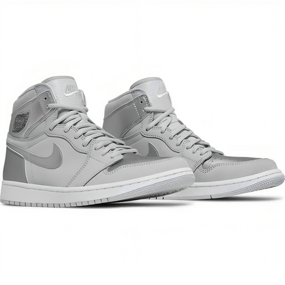 a pair of grey sneakers