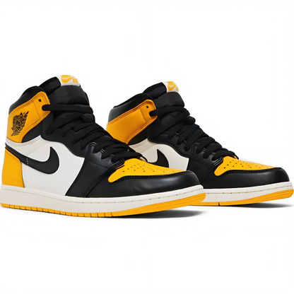 a pair of black and yellow shoes
