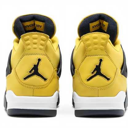 a pair of yellow and black sneakers