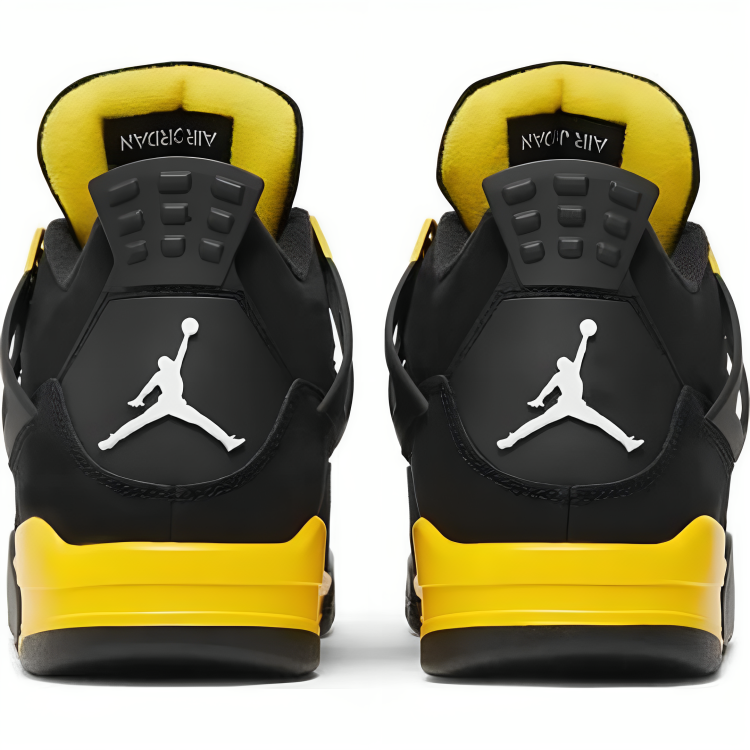 a pair of black and yellow sneakers