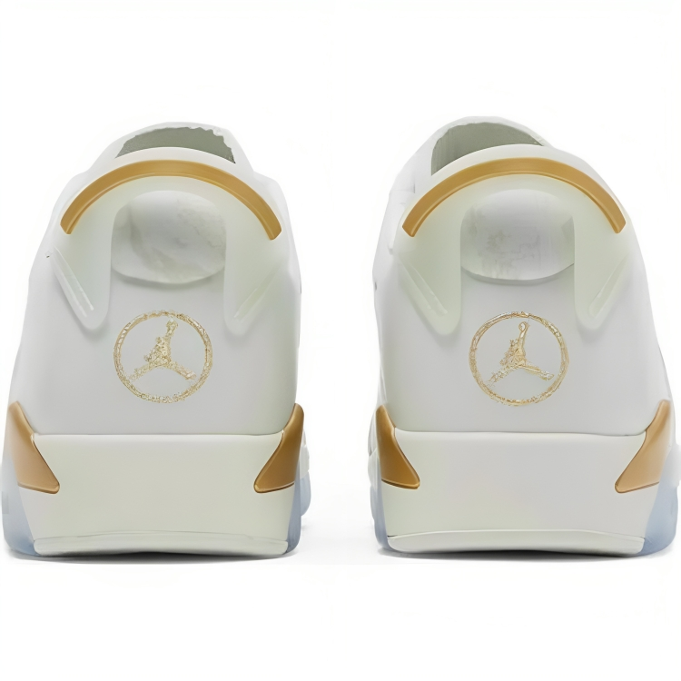 a pair of white and gold shoes