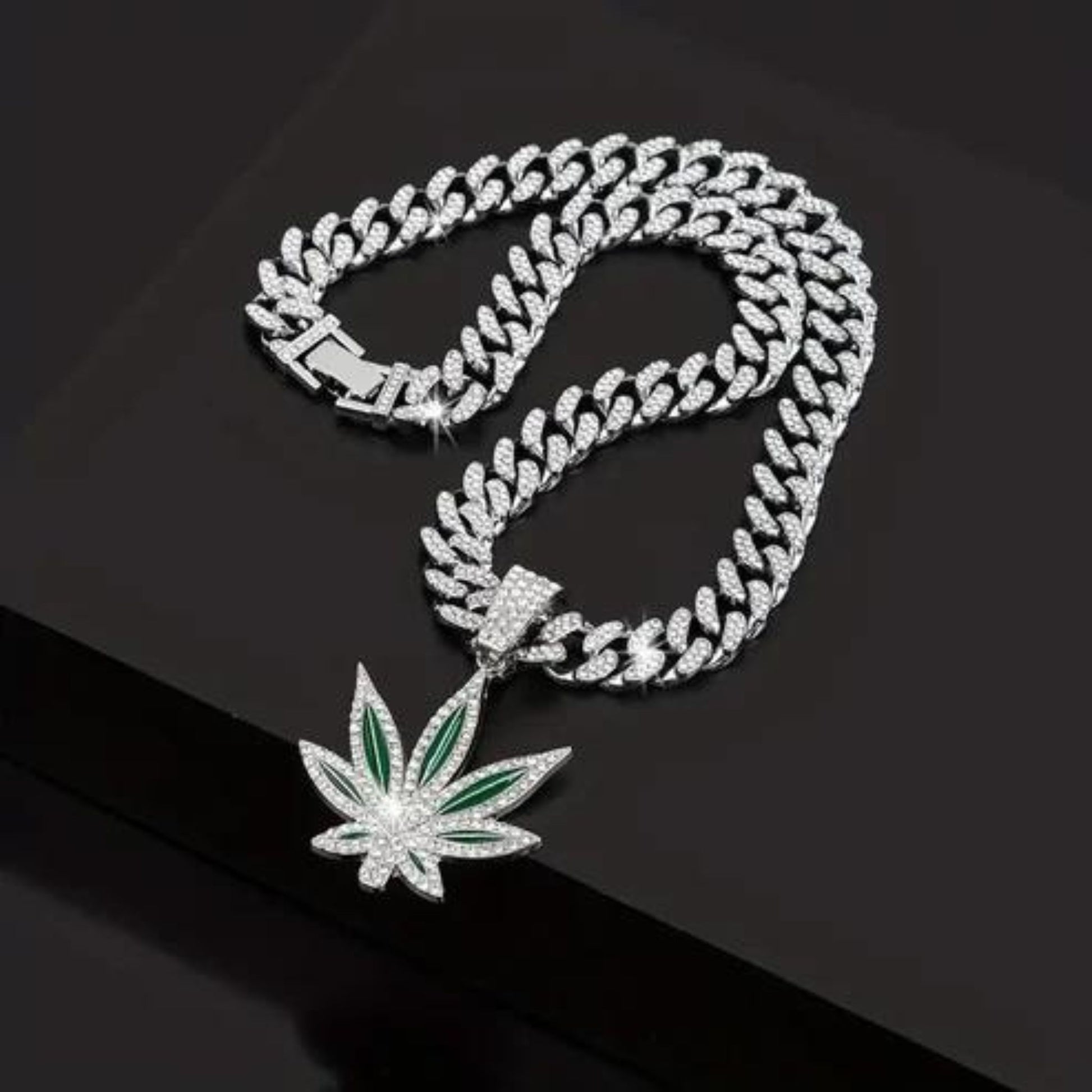 a necklace with a leaf