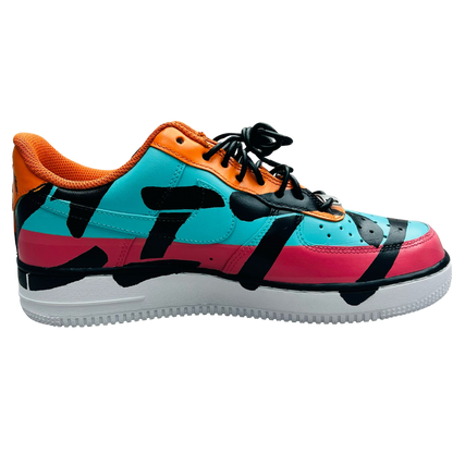 a colorful shoe with black and orange paint