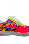 a colorful shoe with a white sole