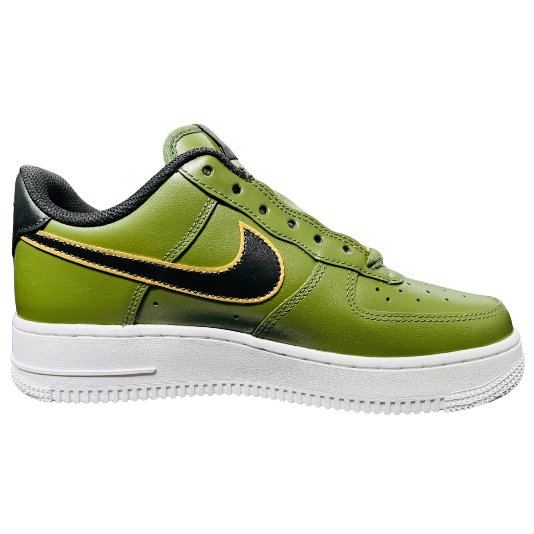 a green shoe with white sole
