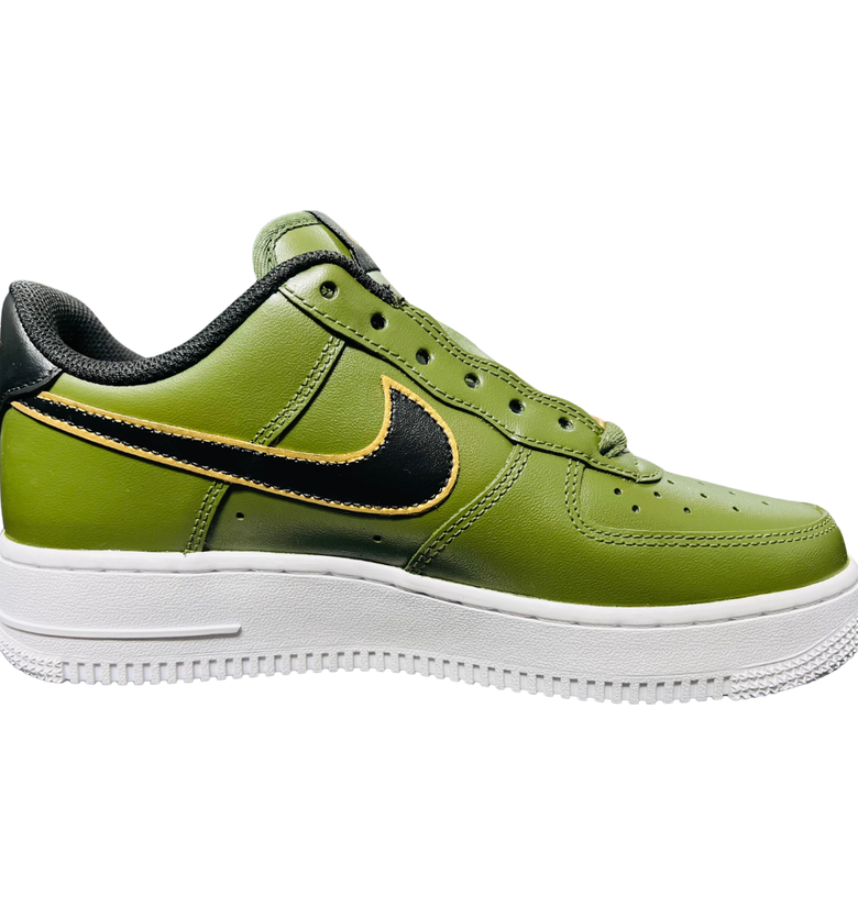 a green shoe with white sole