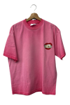 a pink shirt on a swinger