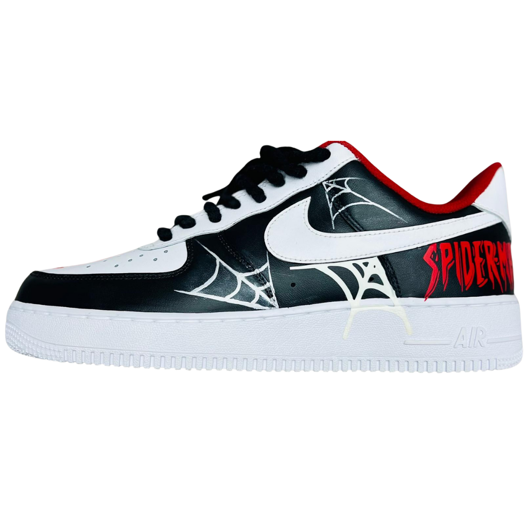 a black and white shoe with red text on it