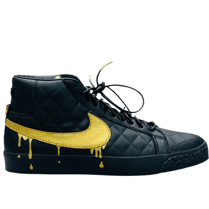 a black and yellow shoe 