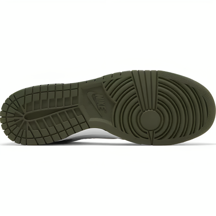 a sole of a green and white sneaker