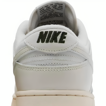 a close of white sneakers and print on it