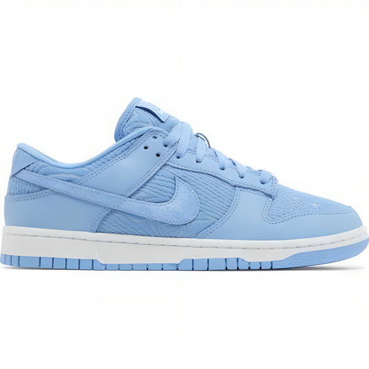 a blue sneaker with white sole