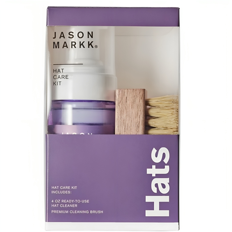 a purple box with a white label and a bottle of hair care kit