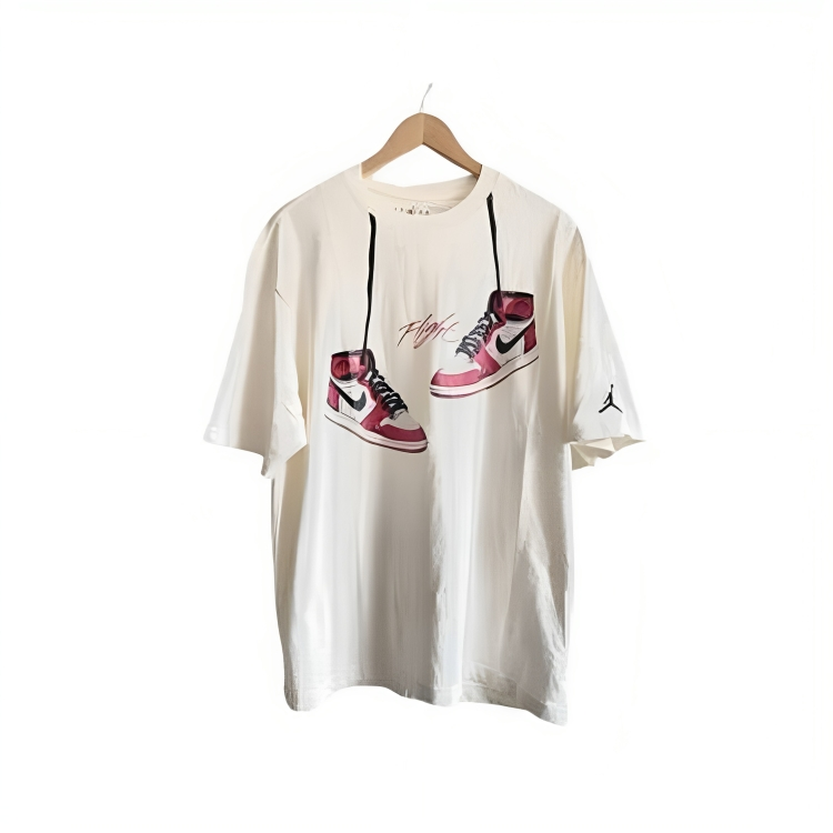 a white t-shirt with red shoes print on it