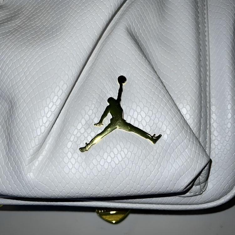 a white bag with a logo on it
