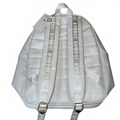 a white backpack with straps