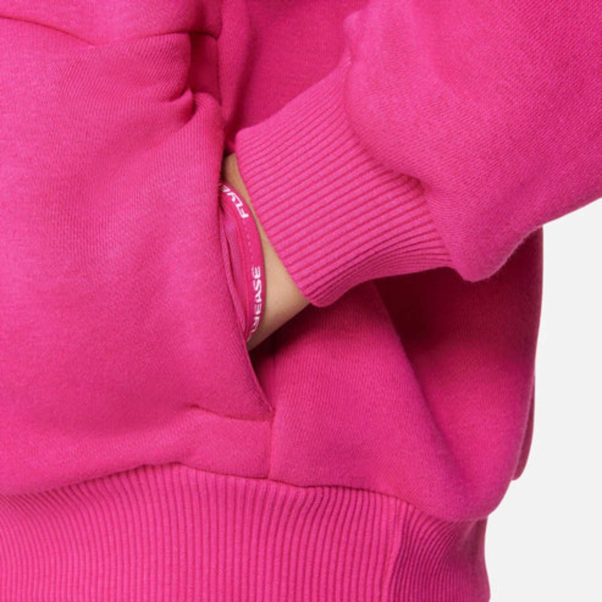 a close of a pink hoodie