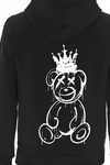 a black hoodie with a white drawing of a teddy bear