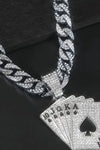 A necklace made of diamond poker chips, featuring a single diamond poker chip pendant.