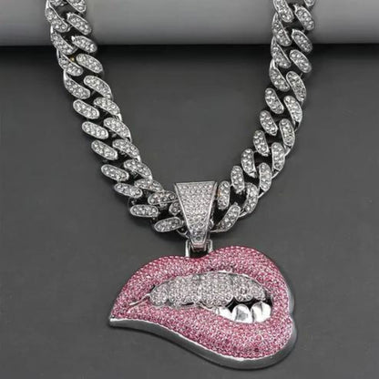 a chain with shiny lip pendant