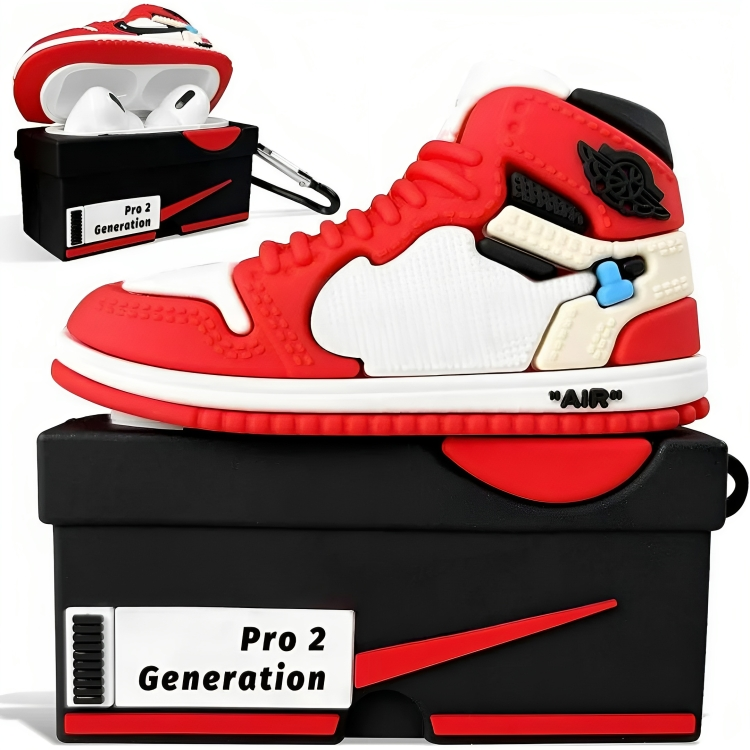 a red and white shoe on top of a black box