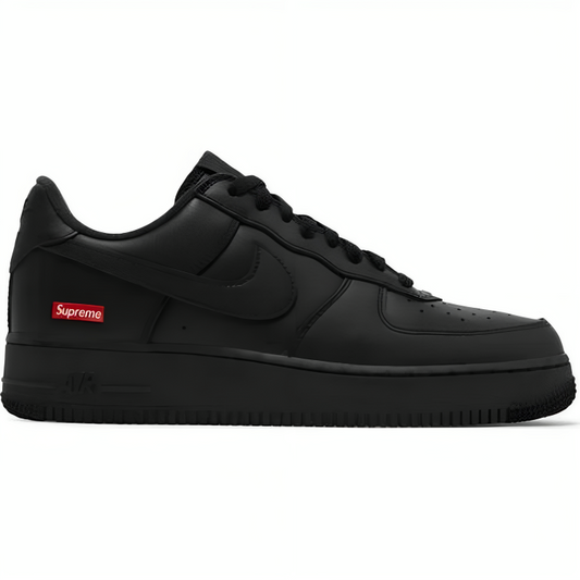 a black sneaker with red logo