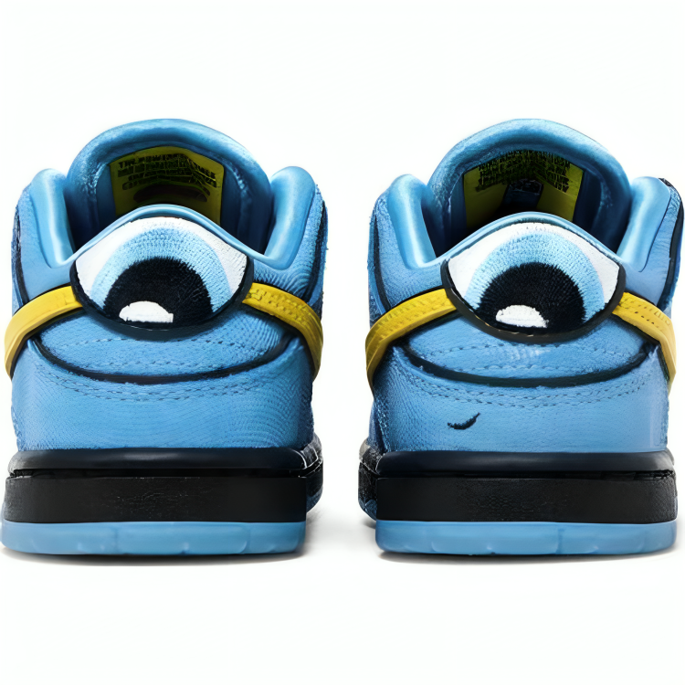 a pair of blue shoes with cartoon eyes