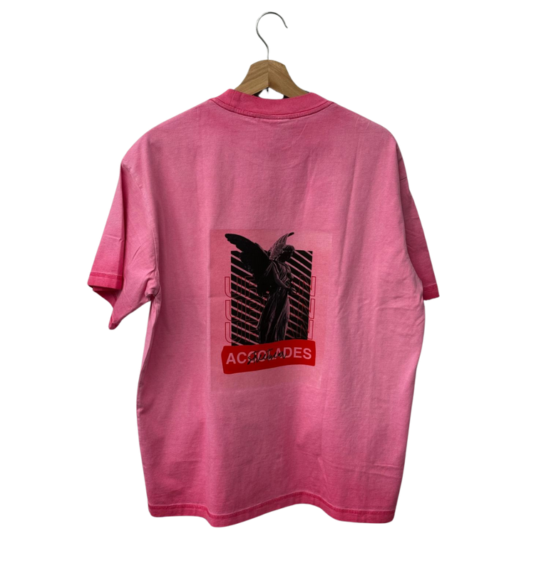 a pink shirt with a black background