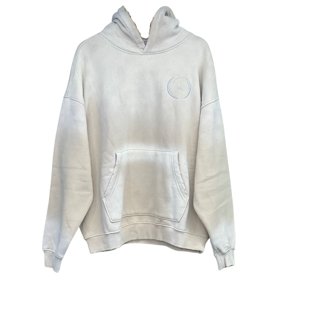 a white sweatshirt with a logo on it
