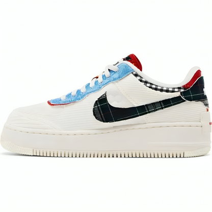 a white sneaker with a blue and red patchwork design