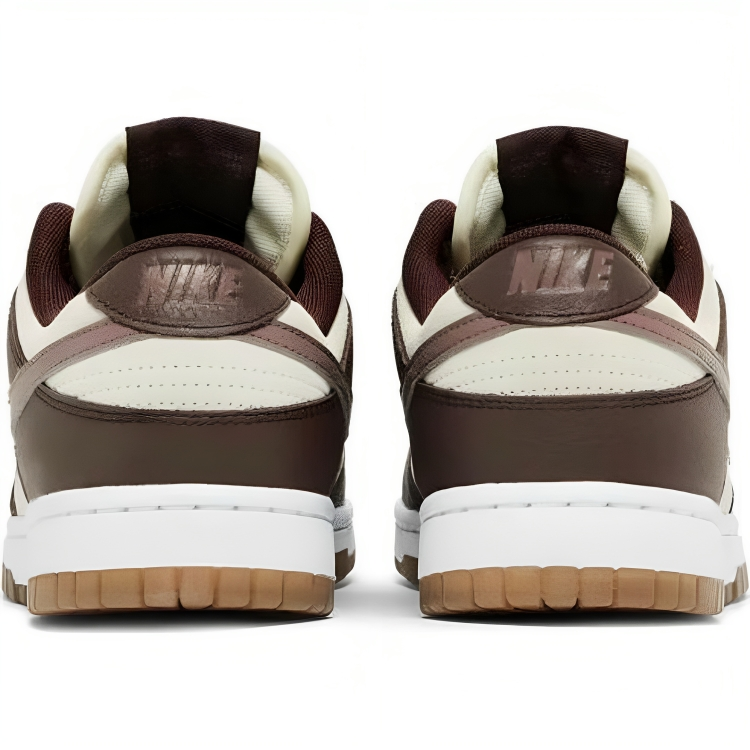 a pair of brown and white sneakers