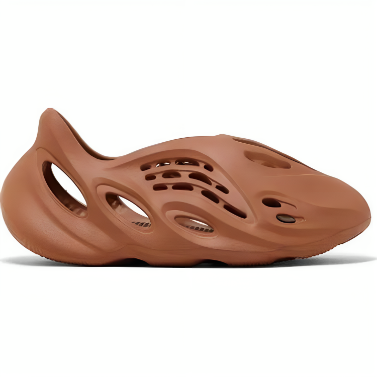 a brown shoe with holes