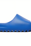 a blue slipper on a white background