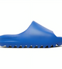 a blue slipper on a white background