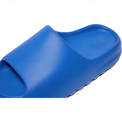 a blue slipper on a white background
